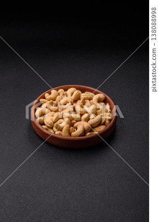 Roasted or raw cashew make a savory snack for a healthy, filling meal. Cashew nuts 138088998