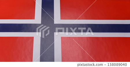 Norwegian national flag in red, blue and white color as a symbol of independence. Flag of Norway Norwegian national flag in red, blue and white color as a symbol of independence. Flag of Norway 138089040