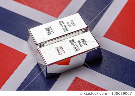 A silver bar against a backdrop of Norway flag, as a concept for the sales market. A silver bar 138089067