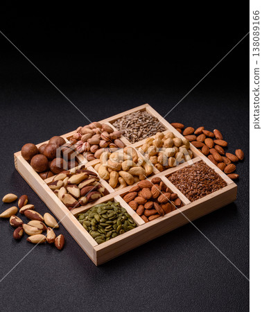 A mix of cashews, pistachios, almonds, macadamia and hazelnuts. Nuts as a food background 138089166