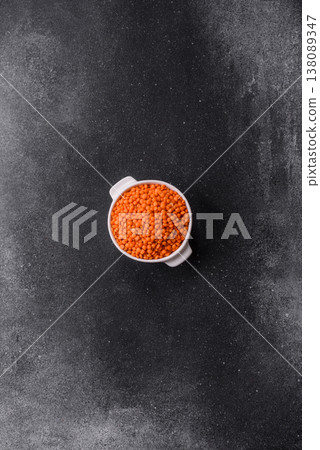 Raw red lentils as a source of protein for a healthy vegan meal. Red lentils Raw red lentils as a source of protein for a healthy vegan meal. Red lentils 138089347