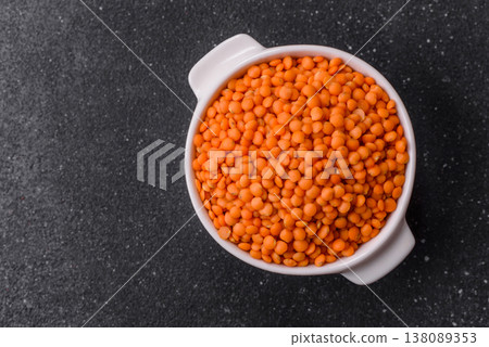 Raw red lentils as a source of protein for a healthy vegan meal. Red lentils Raw red lentils as a source of protein for a healthy vegan meal. Red lentils 138089353