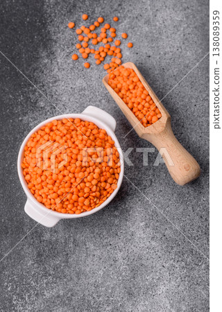 Raw red lentils as a source of protein for a healthy vegan meal. Red lentils Raw red lentils as a source of protein for a healthy vegan meal. Red lentils 138089359