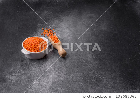 Raw red lentils as a source of protein for a healthy vegan meal. Red lentils Raw red lentils as a source of protein for a healthy vegan meal. Red lentils 138089363