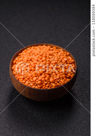 Raw red lentils as a source of protein for a healthy vegan meal. Red lentils Raw red lentils as a source of protein for a healthy vegan meal. Red lentils 138089384