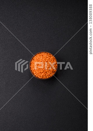 Raw red lentils as a source of protein for a healthy vegan meal. Red lentils Raw red lentils as a source of protein for a healthy vegan meal. Red lentils 138089388