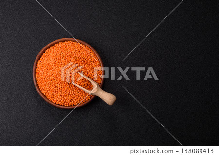 Raw red lentils as a source of protein for a healthy vegan meal. Red lentils Raw red lentils as a source of protein for a healthy vegan meal. Red lentils 138089413