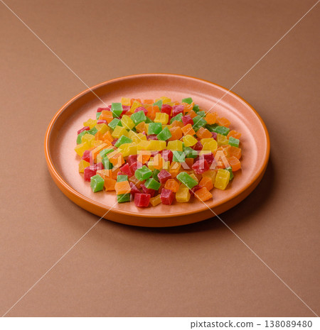 Candied fruit in colorful cubes as an ingredient for baked goods and sweets. Candied fruit 138089480