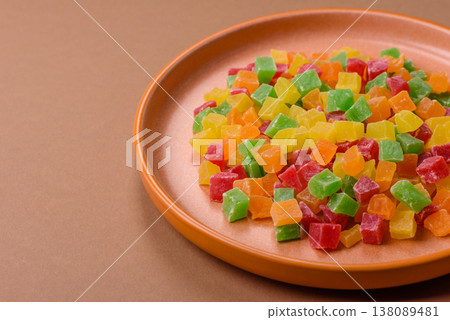 Candied fruit in colorful cubes as an ingredient for baked goods and sweets. Candied fruit 138089481