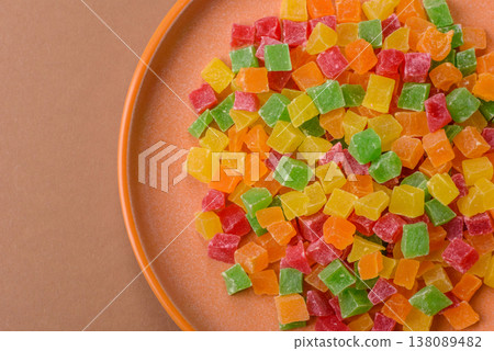 Candied fruit in colorful cubes as an ingredient for baked goods and sweets. Candied fruit 138089482