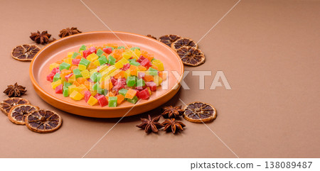 Candied fruit in colorful cubes as an ingredient for baked goods and sweets. Candied fruit Candied fruit in colorful cubes as an ingredient for baked goods and sweets. Candied fruit 138089487