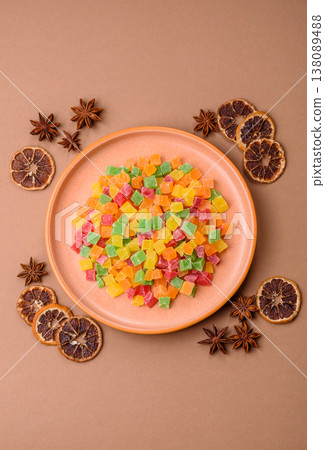 Candied fruit in colorful cubes as an ingredient for baked goods and sweets. Candied fruit Candied fruit in colorful cubes as an ingredient for baked goods and sweets. Candied fruit 138089488