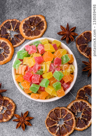 Candied fruit in colorful cubes as an ingredient for baked goods and sweets. Candied fruit Candied fruit in colorful cubes as an ingredient for baked goods and sweets. Candied fruit 138089498