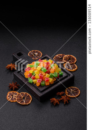 Candied fruit in colorful cubes as an ingredient for baked goods and sweets. Candied fruit 138089514