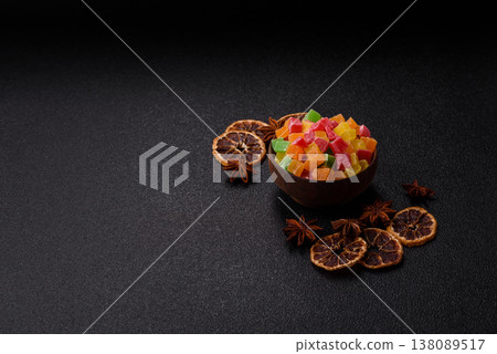Candied fruit in colorful cubes as an ingredient for baked goods and sweets. Candied fruit Candied fruit in colorful cubes as an ingredient for baked goods and sweets. Candied fruit 138089517