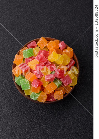Candied fruit in colorful cubes as an ingredient for baked goods and sweets. Candied fruit 138089524