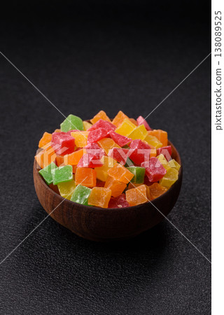 Candied fruit in colorful cubes as an ingredient for baked goods and sweets. Candied fruit Candied fruit in colorful cubes as an ingredient for baked goods and sweets. Candied fruit 138089525