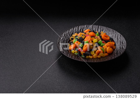 Dried apricots, raisins, and candied fruits as ingredients for baked goods and sweets. Dried fruits 138089529