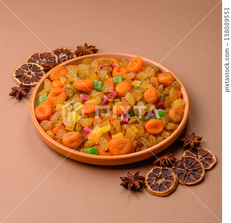 Dried apricots, raisins, and candied fruits as ingredients for baked goods and sweets. Dried fruits Dried apricots, raisins, and candied fruits as ingredients for baked goods and sweets. Dried fruits 138089551