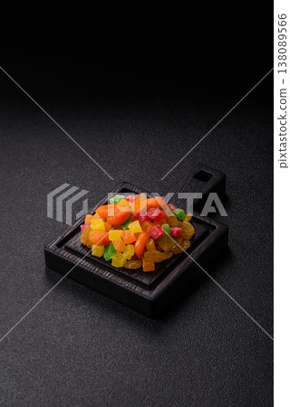 Dried apricots, raisins, and candied fruits as ingredients for baked goods and sweets. Dried fruits Dried apricots, raisins, and candied fruits as ingredients for baked goods and sweets. Dried fruits 138089566