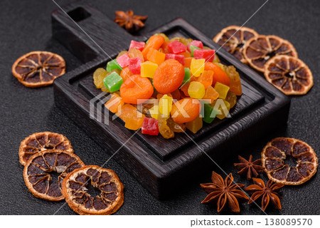 Dried apricots, raisins, and candied fruits as ingredients for baked goods and sweets. Dried fruits Dried apricots, raisins, and candied fruits as ingredients for baked goods and sweets. Dried fruits 138089570