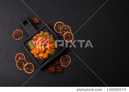 Dried apricots, raisins, and candied fruits as ingredients for baked goods and sweets. Dried fruits Dried apricots, raisins, and candied fruits as ingredients for baked goods and sweets. Dried fruits 138089574