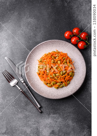 Asian salad with edamame beans, carrots, tofu, and spices. Edamame and carrot salad 138090034