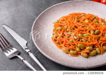 Asian salad with edamame beans, carrots, tofu, and spices. Edamame and carrot salad Asian salad with edamame beans, carrots, tofu, and spices. Edamame and carrot salad 138090036