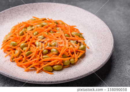 Asian salad with edamame beans, carrots, tofu, and spices. Edamame and carrot salad Asian salad with edamame beans, carrots, tofu, and spices. Edamame and carrot salad 138090038