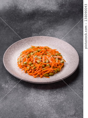Asian salad with edamame beans, carrots, tofu, and spices. Edamame and carrot salad Asian salad with edamame beans, carrots, tofu, and spices. Edamame and carrot salad 138090043