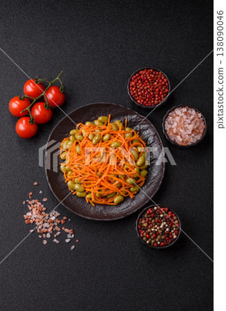 Asian salad with edamame beans, carrots, tofu, and spices. Edamame and carrot salad Asian salad with edamame beans, carrots, tofu, and spices. Edamame and carrot salad 138090046