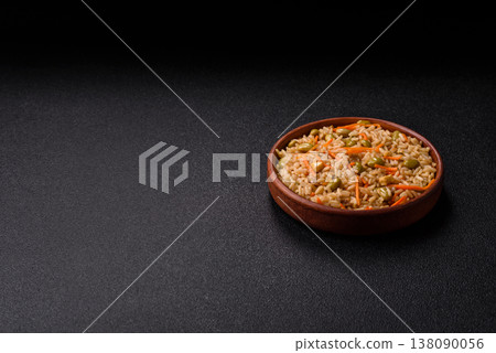 Asian food with rice, edamame, carrots, tofu, and spices. Rice with edamame and carrots Asian food with rice, edamame, carrots, tofu, and spices. Rice with edamame and carrots 138090056