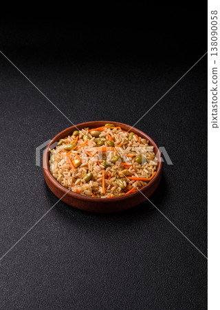 Asian food with rice, edamame, carrots, tofu, and spices. Rice with edamame and carrots Asian food with rice, edamame, carrots, tofu, and spices. Rice with edamame and carrots 138090058
