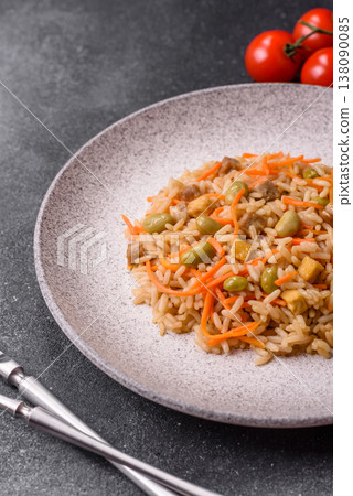 Asian food with rice, edamame, carrots, tofu, and spices. Rice with edamame and carrots Asian food with rice, edamame, carrots, tofu, and spices. Rice with edamame and carrots 138090085