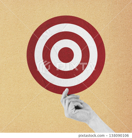 Hand reaching for marketing bullseye target goal 138090106