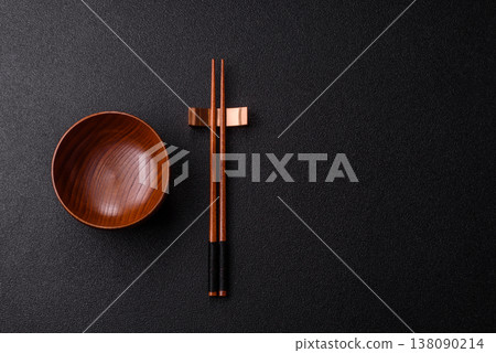An empty round brown wooden bowl for Asian food. An empty wooden bowl An empty round brown wooden bowl for Asian food. An empty wooden bowl 138090214