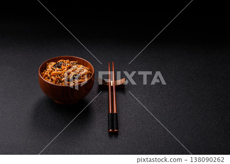Yakisoba, Asian noodles with vegetables and meat, is a Japanese spicy food. Yakisoba or udon Yakisoba, Asian noodles with vegetables and meat, is a Japanese spicy food. Yakisoba or udon 138090262
