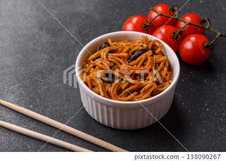 Yakisoba, Asian noodles with vegetables and meat, is a Japanese spicy food. Yakisoba or udon Yakisoba, Asian noodles with vegetables and meat, is a Japanese spicy food. Yakisoba or udon 138090267