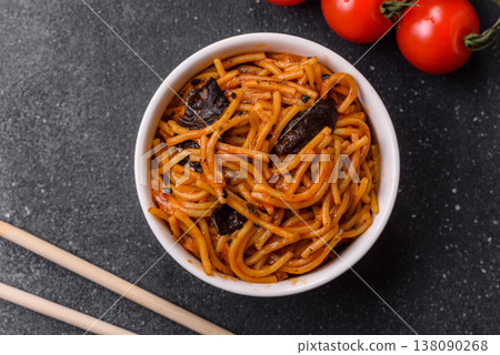Yakisoba, Asian noodles with vegetables and meat, is a Japanese spicy food. Yakisoba or udon Yakisoba, Asian noodles with vegetables and meat, is a Japanese spicy food. Yakisoba or udon 138090268
