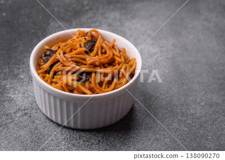 Yakisoba, Asian noodles with vegetables and meat, is a Japanese spicy food. Yakisoba or udon Yakisoba, Asian noodles with vegetables and meat, is a Japanese spicy food. Yakisoba or udon 138090270