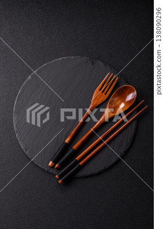 An empty round brown wooden bowl for Asian food. An empty wooden bowl 138090296