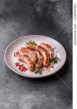 Grilled pork or chicken sausages, smoked fried food with salt and spices. Grilled sausages Grilled pork or chicken sausages, smoked fried food with salt and spices. Grilled sausages 138090363