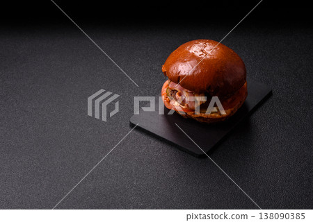 A burger with a patty, cheese, vegetables, and sauce. A burger with meat A burger with a patty, cheese, vegetables, and sauce. A burger with meat 138090385