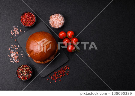 A burger with a patty, cheese, vegetables, and sauce. A burger with meat A burger with a patty, cheese, vegetables, and sauce. A burger with meat 138090389