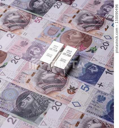 A silver bar, white metal against a backdrop of Polish flag, as a concept. A silver bar 138090496