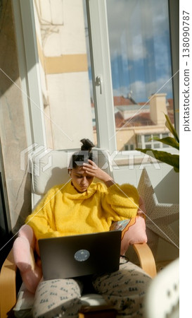 Serene Girl Enjoying Peaceful Day Indoors. Young Woman Resting Comfortably In Cozy Domestic Environment Serene Girl Enjoying Peaceful Day Indoors. Young Woman Resting Comfortably In Cozy Domestic Environment 138090787