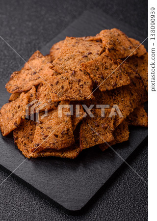 Croutons or crackers made from rye bread with garlic, salt, and spices. Croutons with salt Croutons or crackers made from rye bread with garlic, salt, and spices. Croutons with salt 138090939