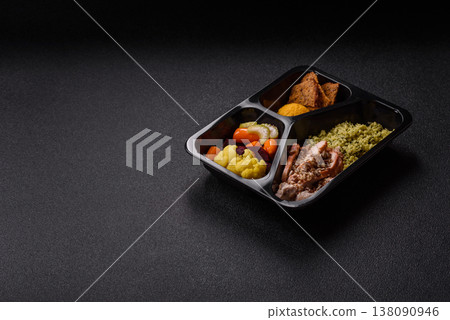 A bowl with chicken or turkey, porridge, vegetables, sauce, and spices. A meat bowl A bowl with chicken or turkey, porridge, vegetables, sauce, and spices. A meat bowl 138090946