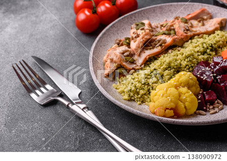 A bowl with chicken or turkey, porridge, vegetables, sauce, and spices. A meat bowl A bowl with chicken or turkey, porridge, vegetables, sauce, and spices. A meat bowl 138090972