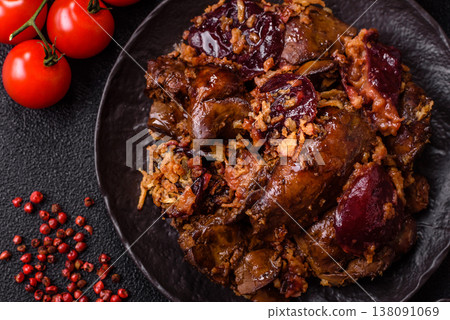 Chicken, duck, or goose liver with plums, onions, and spices. Chicken liver 138091069